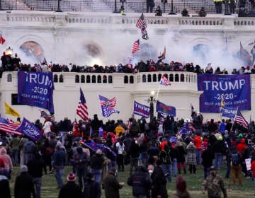 Protesters storm the Capitol on Jan. 6. (John Minchillo/AP)
