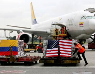 View of containers with some of the 3.5 million doses of vaccines against COVID-19 from Moderna laboratory donated by US government, on their arrival at El Dorado International Airport, in Bogota on July 25, 2021. (Photo by Leonardo Munoz / AFP) (Photo by LEONARDO MUNOZ/AFP via Getty Images)