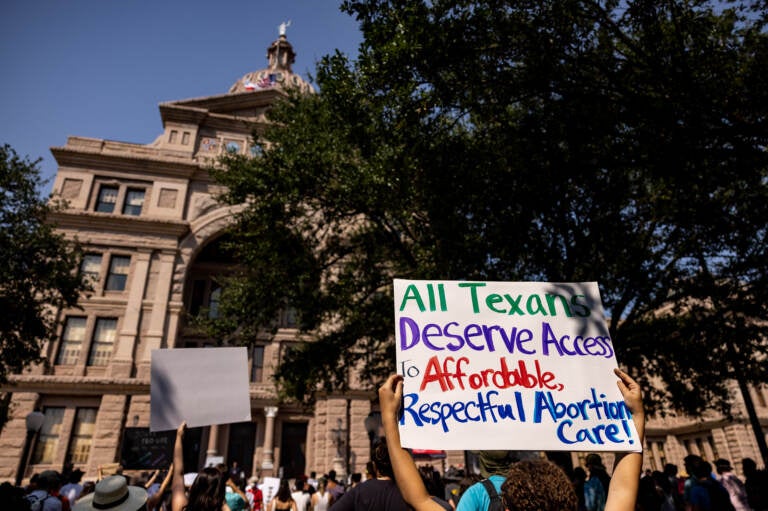 Abortion rights activists rally at the Texas State Capitol on Sept. 11 in Austin in opposition to a restrictive new abortion law. (Jordan Vonderhaar/Getty Images)