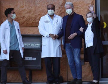 OTANGE CA OCTOBER 17, 2021 - Former President Bill Clinton, standing with his wife, Hillary, and doctors, was discharged from UC Irvine Medical Center Sunday morning, six days after he was admitted and treated for a urological and blood infection. (Allen J. Schaben / Los Angeles Times via Getty Images)