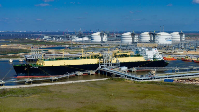 The Asia Vision LNG carrier ship sits docked at the Cheniere Energy Inc. terminal in this aerial photograph taken over Sabine Pass, Texas, U.S., on Wednesday, Feb. 24, 2016. Cheniere said in a statement last month. Cheniere Energy Inc. expects to ship the first cargo of liquefied natural gas on Wednesday to Brazil with another tanker to be loaded a few days later, marking the historic start of U.S. shale exports and sending its shares up the most in more than a month. (Lindsey Janies/Bloomberg via Getty Images)