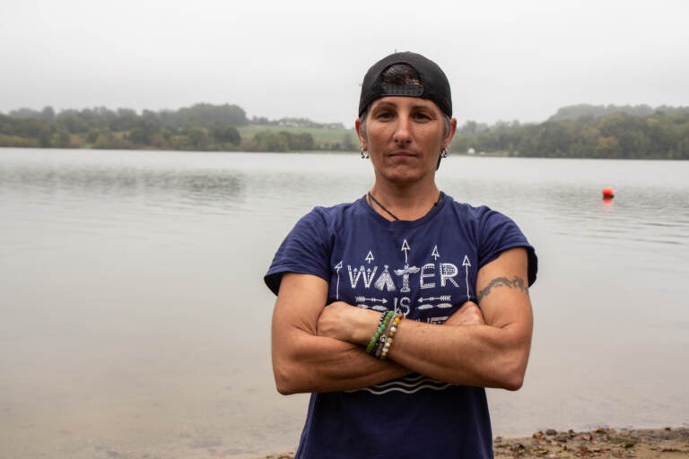 Christina Digiulio stands with her arms crossed in front of Marsh Creek