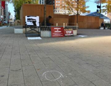 A chalk circle marks the place where a bullet casing landed during a fatal shooting in LOVE Park Tuesday night