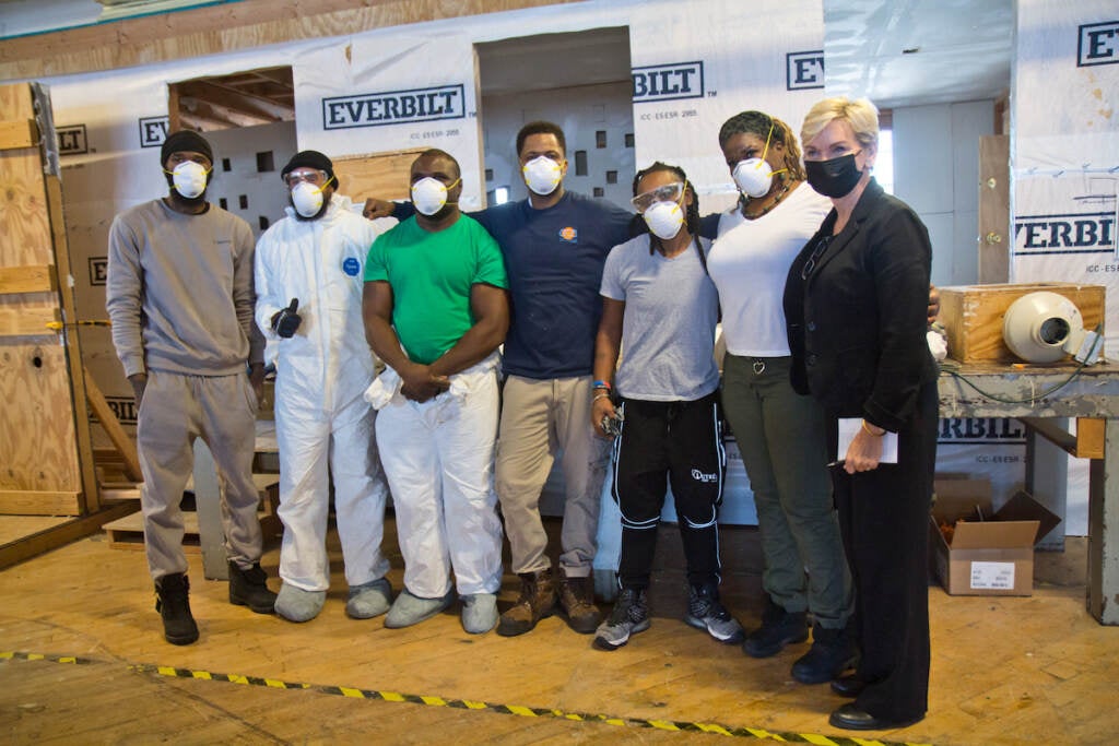 United States Energy Secretary Jennifer Granholm poses with ECA (Energy Coordinating Agency) trainees in Philadelphia’s Kensington neighborhood