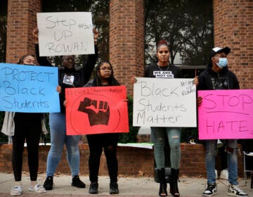 Rowan University students gather outside the Chamberlin Student Center criticize the administration for ignoring racial slurs and unequal treatment directed at Black students