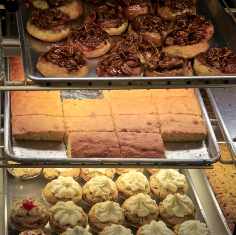 Sticky buns, cornbread, and chocolate chip pies in a bakery's display case. (AP Photo/Bebeto Matthews)