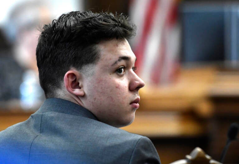 Kyle Rittenhouse looks back at the potential juror pool during the jury selection process at the Kenosha County Courthouse in Kenosha, Wis., Monday, Nov. 1, 2021. Rittenhouse is accused of killing two people and wounding a third during a protest over police brutality in Kenosha, last year. (Sean Krajacic/The Kenosha News via AP, Pool)