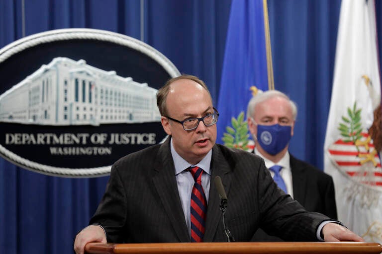 Then Acting Assistant U.S. Attorney General Jeffrey Clark speaks next to then Deputy U.S. Attorney General Jeffrey Rosen at a news conference at the Justice Department in Washington, U.S., October 21, 2020. REUTERS/Yuri Gripas/Pool