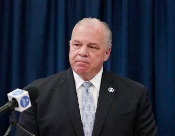 New Jersey Senate President Steve Sweeney speaks with members of the media during a news conference