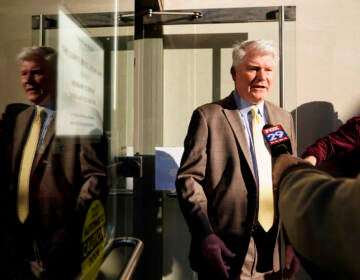 John ''Johnny Doc'' Dougherty speaks with members of the media