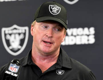 FILE - In this Sept. 19, 2021, file photo, Las Vegas Raiders head coach Jon Gruden meets with the media following an NFL football game against the Pittsburgh Steelers in Pittsburgh. Gruden is out as coach of the Raiders after emails he sent before being hired in 2018 contained racist, homophobic and misogynistic comments. A person familiar with the decision said Gruden is stepping down after The New York Times reported that Gruden frequently used misogynistic and homophobic language directed at Commissioner Roger Goodell and others in the NFL