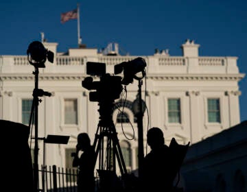 Journalists gather outside the White House, Wednesday, Nov. 4, 2020, in Washington