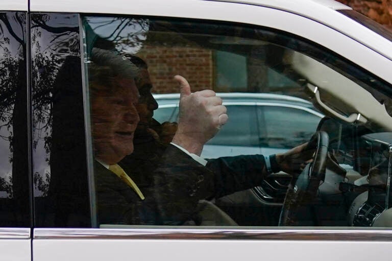 John ''Johnny Doc'' Dougherty gestures as he is driven from the federal courthouse in Philadelphia, Monday, Nov. 15, 2021. Dougherty was found guilty of conspiracy charges Monday in his corruption trial. (AP Photo/Matt Rourke)