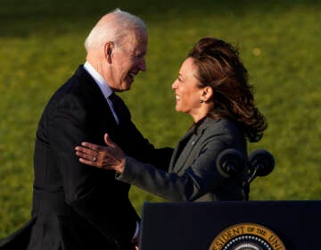 President Joe Biden embraces Vice President Kamala Harris as he speaks before signing the $1.2 trillion bipartisan infrastructure bill into law during a ceremony on the South Lawn of the White House in Washington, Monday, Nov. 15, 2021. (AP Photo/Susan Walsh)