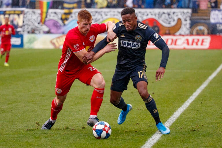 File photo: Philadelphia Union's Sergio Santos, right, and New York Red Bulls' Tim Parker, left, battle for the ball during first half of an MLS soccer Eastern Conference first-round playoff match, Sunday, Oct. 20, 2019, in Chester, Pa. The last time the Philadelphia Union faced the New York Red Bulls to open the Major League Soccer playoffs was not so long ago, in 2019. And it was memorable — especially for the Union