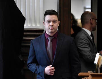 Kyle Rittenhouse enters the courtroom to hear the verdicts in his trial at the Kenosha County Courthouse in Kenosha, Wis., on Friday, Nov. 19, 2021. Rittenhouse has been acquitted of all charges after pleading self-defense in the deadly Kenosha shootings that became a flashpoint in the nation’s debate over guns, vigilantism and racial injustice. The jury came back with its verdict afer close to 3 1/2 days of deliberation