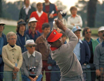 FILE - Lee Elder participates in the Masters Tournament at Augusta, Ga., May 9, 1975. Elder broke down racial barriers as the first Black golfer to play in the Masters and paved the way for Tiger Woods and others to follow. The PGA Tour confirmed Elder’s death, which was first reported by Debert Cook of African American Golfers Digest. No cause or details were immediately available, but the tour said it spoke with Elder's family. He was 87. (AP Photo/Lou Krasky, File)