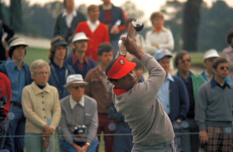 FILE - Lee Elder participates in the Masters Tournament at Augusta, Ga., May 9, 1975. Elder broke down racial barriers as the first Black golfer to play in the Masters and paved the way for Tiger Woods and others to follow. The PGA Tour confirmed Elder’s death, which was first reported by Debert Cook of African American Golfers Digest. No cause or details were immediately available, but the tour said it spoke with Elder's family. He was 87. (AP Photo/Lou Krasky, File)