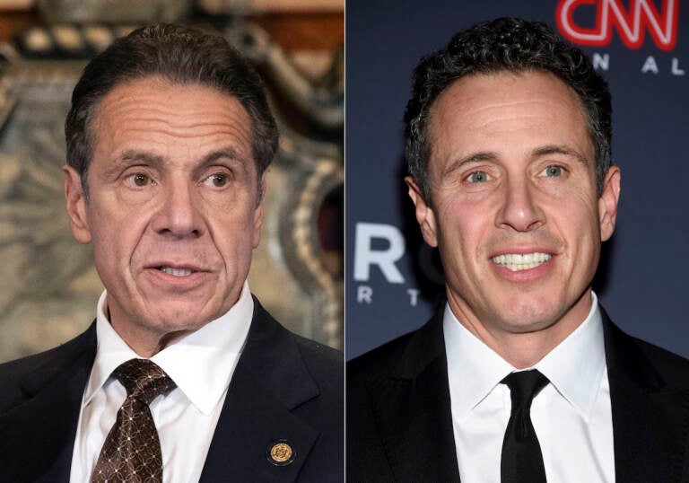 File photo: New York Gov. Andrew Cuomo, left, appears during a news conference about COVID-19 at the State Capitol in Albany, N.Y., on Dec. 3, 2020, and his brother CNN anchor Chris Cuomo attends the 12th annual CNN Heroes: An All-Star Tribute at the American Museum of Natural History in New York on Dec. 9, 2018. CNN said Tuesday, Nov. 30, 2021, it was suspending Chris Cuomo indefinitely after details emerged about how he helped his brother, as he faced charges of sexual harassment