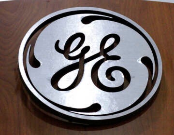 This Jan. 16, 2014 file photo shows the General Electric logo at a store in Cranberry Township, Pa. (AP Photo/Gene J. Puskar, File)