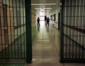 FILE PHOTO: Officers at the Cumberland County Prison walk the halls, Thursday, April 3, 2003, in Carlisle, Pa. (Carolyn Kaster / AP Photo)