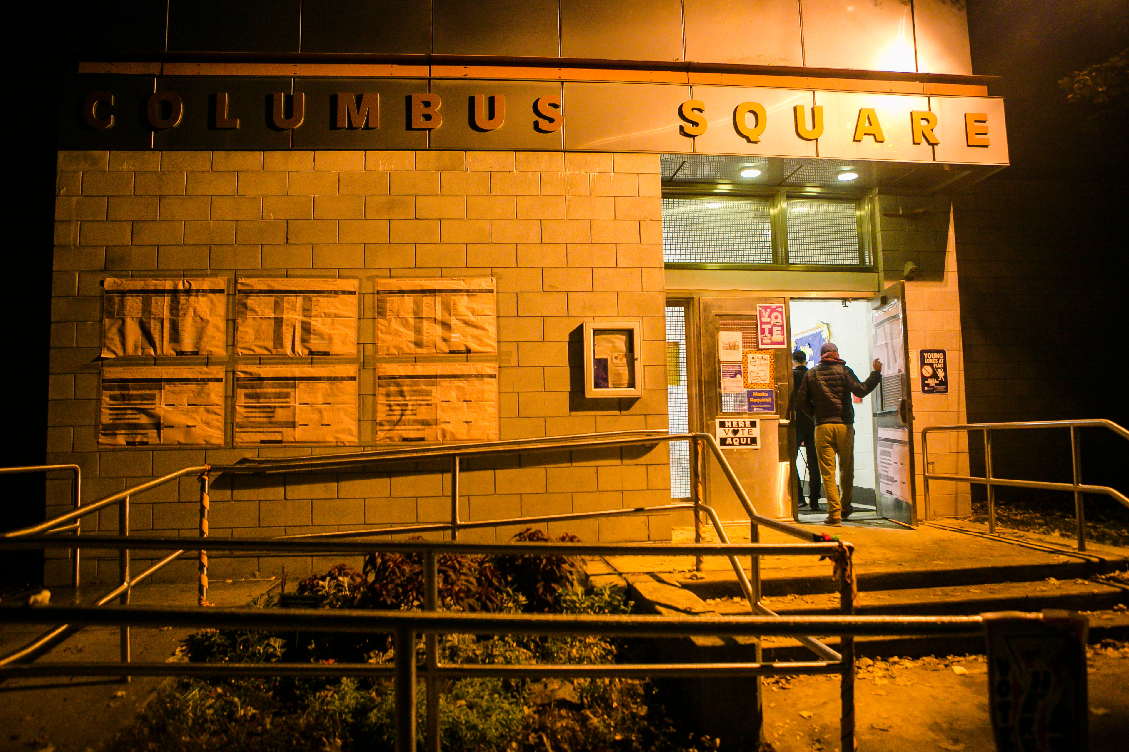 Voters arrive at a a polling place at Columbus Square Parking in South Philadelphia before poll places close during the general election in Philadelphia, PA on Tuesday, Nov. 2, 2021. Voters continue to cast their votes before the polls close and despite the rain