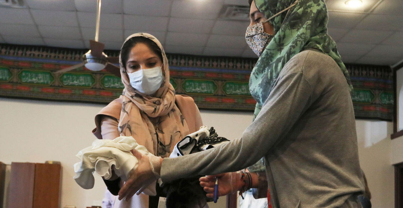 [l-r]: Rona Farighi, community outreach and healthcare coordinator at AOPxSOLA, and Tahmina Achekzai, communications manager at AOPxSOLA, sorting donations.
A donation pack up for incoming Afghan refugees run by AOPxSOLA and members of Imam Ali Masjid Mosque at Imam Ali Masjid Mosque in Pennsauken, NJ on 11/14/21.
[DANIELLA HEMINGHAUS]