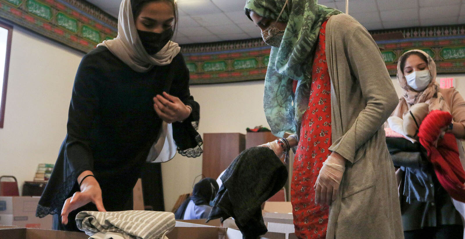 [l-r]: Sarah Ahmad, a mosque attendee from Moorestown, Tahmina Achekzai, communications manager at AOPxSOLA, and Rona Farighi, community outreach and healthcare coordinator at AOPxSOLA, sorting donations.
A donation pack up for incoming Afghan refugees run by AOPxSOLA and members of Imam Ali Masjid Mosque at Imam Ali Masjid Mosque in Pennsauken, NJ on 11/14/21.
[DANIELLA HEMINGHAUS]
