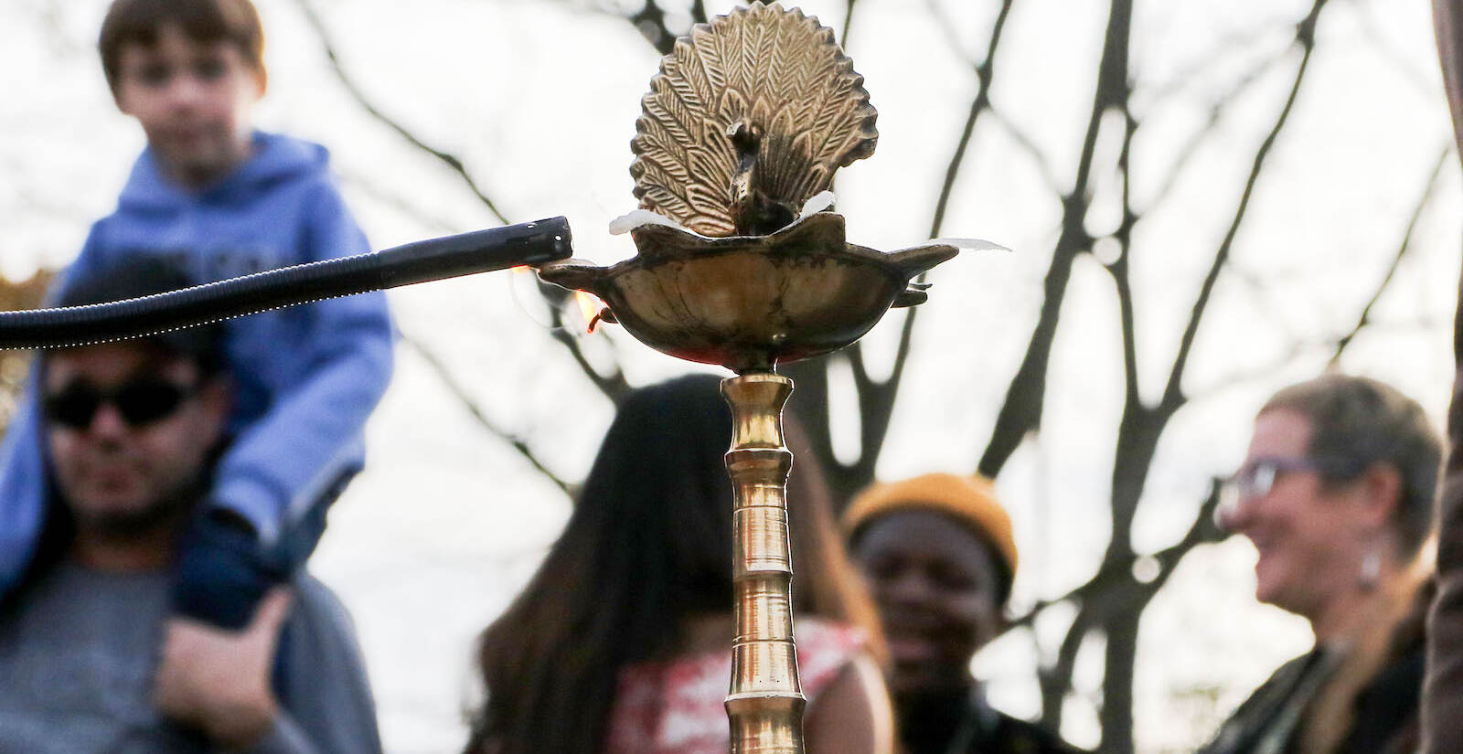 Lighting the Diya. 
The first annual Diwali festival in Doylestown, PA on 11/7/21.
[DANIELLA HEMINGHAUS]