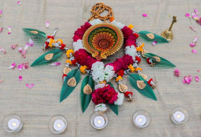 Display of flowers and candles for a Diwali celebration in Doylestown, Pa. in 2021.