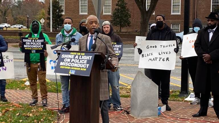 Rev. Al Sharpton speaks outside Legislative Hall in Dover Monday afternoon in support of legislation that would open up police misconduct records to public scrutiny. (Mark Eichmann/WHYY)