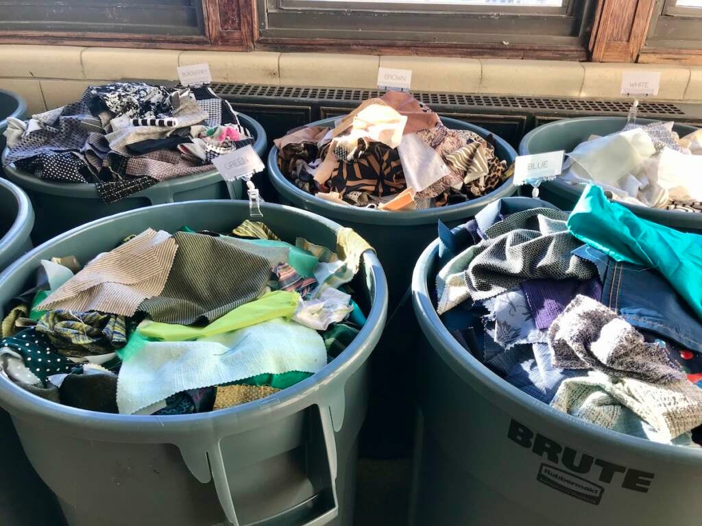 Barrels of fabric scraps for sale at FABSCRAP