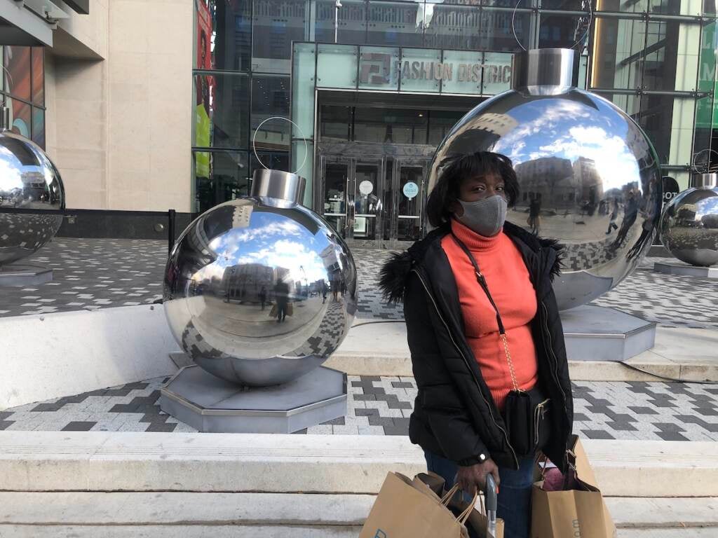 North Philadelphia resident, Theresa Nelson, stands outside the 9th and Market Fashion District Mall