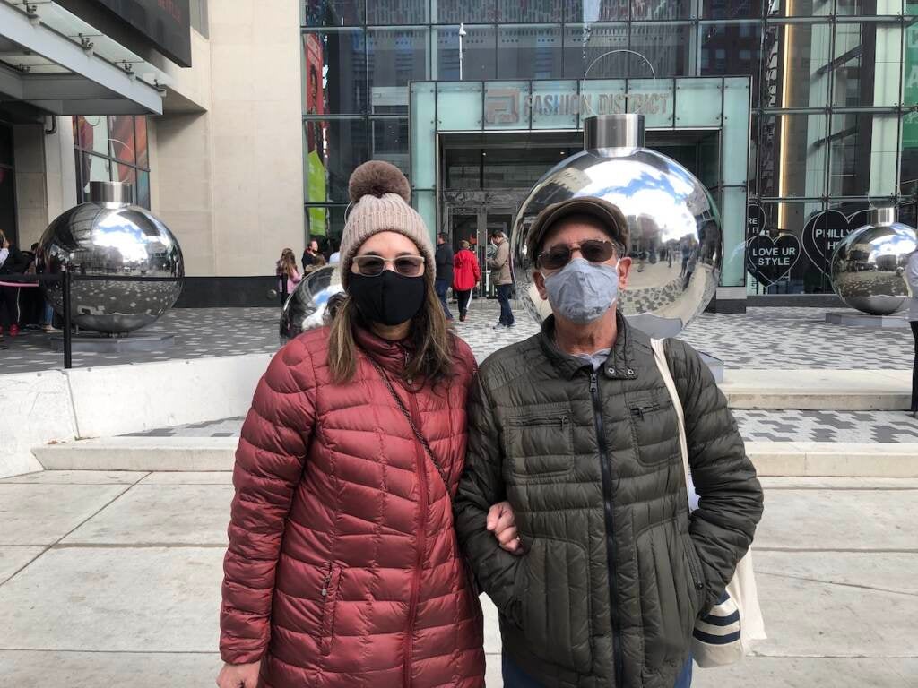 South Philadelphia residents Chanda and Nicholas Nastasi stand outside the Philadelphia Fashion District shopping center