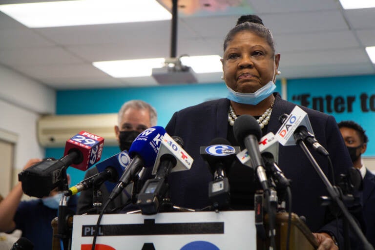 Veronica Joyner speaks from a podium during a press conference