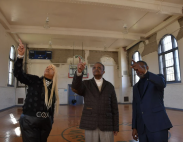 From left, Revs. Jeanette Davis, Robert Collier Sr. and Greg Holston show ceiling damage in the Waterview Recreation Center's Gym in Northwest Philadelphia. (Abdul R. Sulayman/ The Philadelphia Tribune).