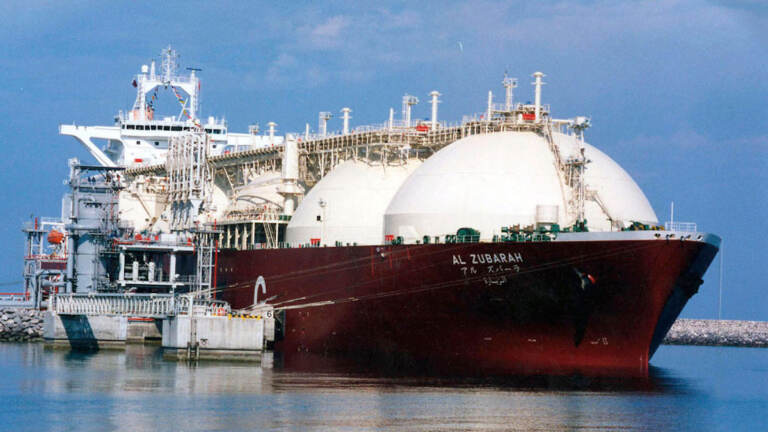 A tanker ship being loaded with LNG