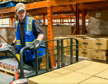 A warehouse worker at a Food Bank of Delaware