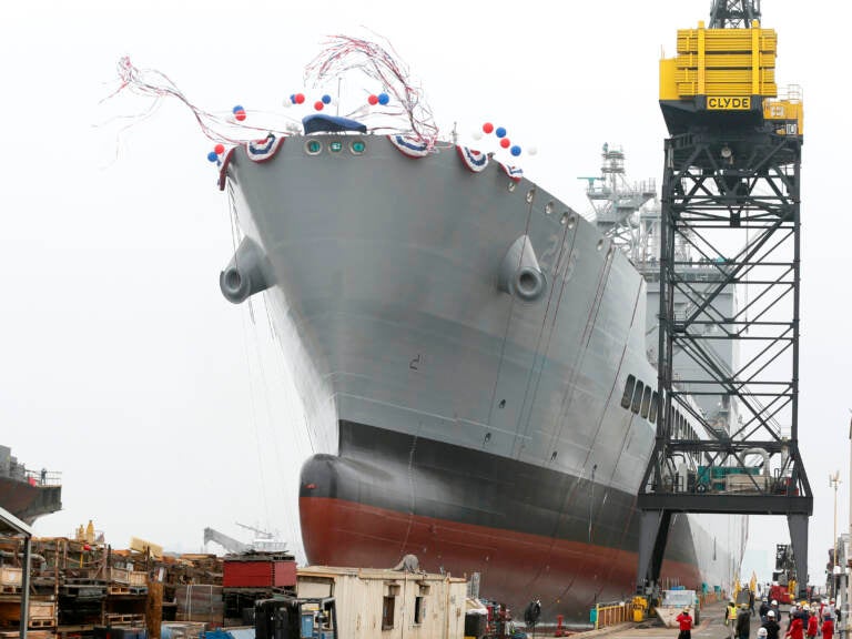 The U.S. Navy launches the USNS Harvey Milk, a fleet replenishment oiler ship named after the first openly gay elected official, in San Diego, Saturday, Nov. 6, 2021. The Navy ship is the second of six vessels in the Navy's John Lewis-class program, second to the USNS John Lewis. (AP Photo/Alex Gallardo)