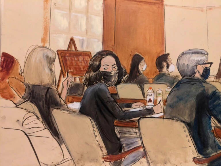In this courtroom sketch, Ghislaine Maxwell looks over her shoulder to the courtroom audience