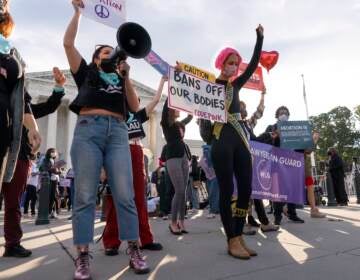 Pro-choice and anti-abortion activists rally outside the Supreme Court, Monday, Nov. 1, 2021, as arguments are set to begin about abortion by the court, on Capitol Hill in Washington. (AP Photo/Jacquelyn Martin)