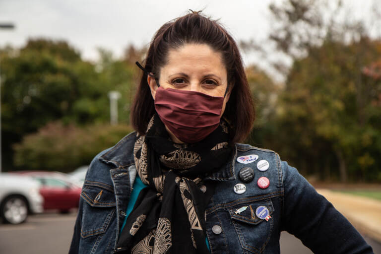 Jessica D’Angelo wears a mask outside a polling place