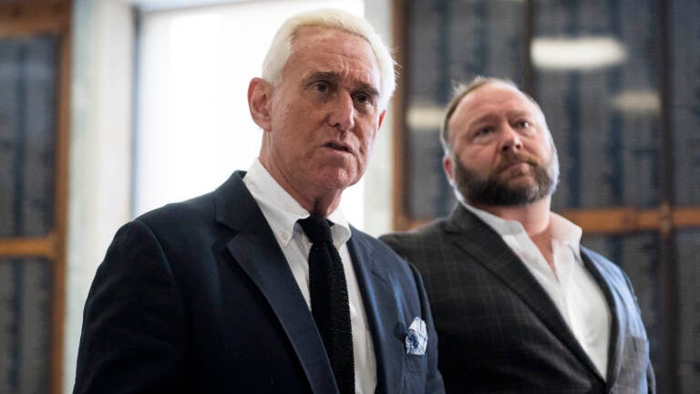 Roger Stone, left, and Alex Jones hold a press conference before attending a House Judiciary Committee hearing in 2018. (Bill Clark/CQ-Roll Call, Inc via Getty Images)