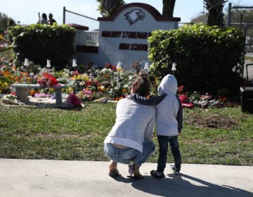 A memorial is seen outside Marjory Stoneman Douglas High School