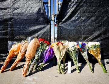 Flowers s are seen outside of the canceled Astroworld festival at NRG Park on November 6, 2021 in Houston, Texas. According to authorities, eight people died and 17 people were transported to local hospitals after what they describe as a crowd surge at the Astroworld festival, a music festival started by Houston-native rapper and musician Travis Scott in 2018. (Photo by Alex Bierens de Haan/Getty Images)