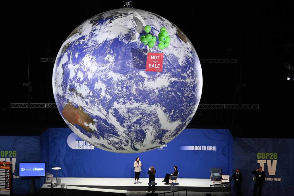 Greenpeace activists hold a protest in the action zone