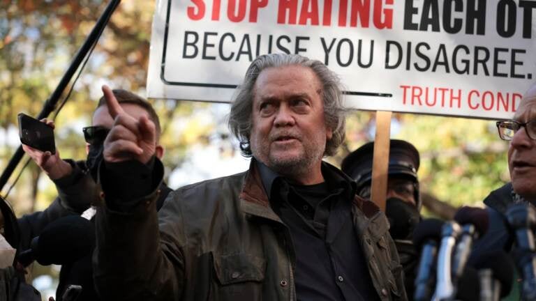 Steve Bannon and his lawyer David Schoen speak to reporters outside of the E. Barrett Prettyman Federal District Court House