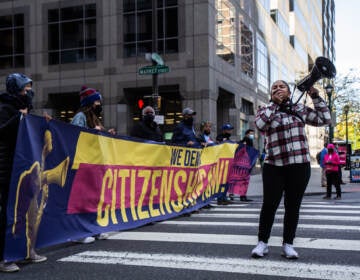 Maegan Llerena leads protesters at 20th and Matket streets