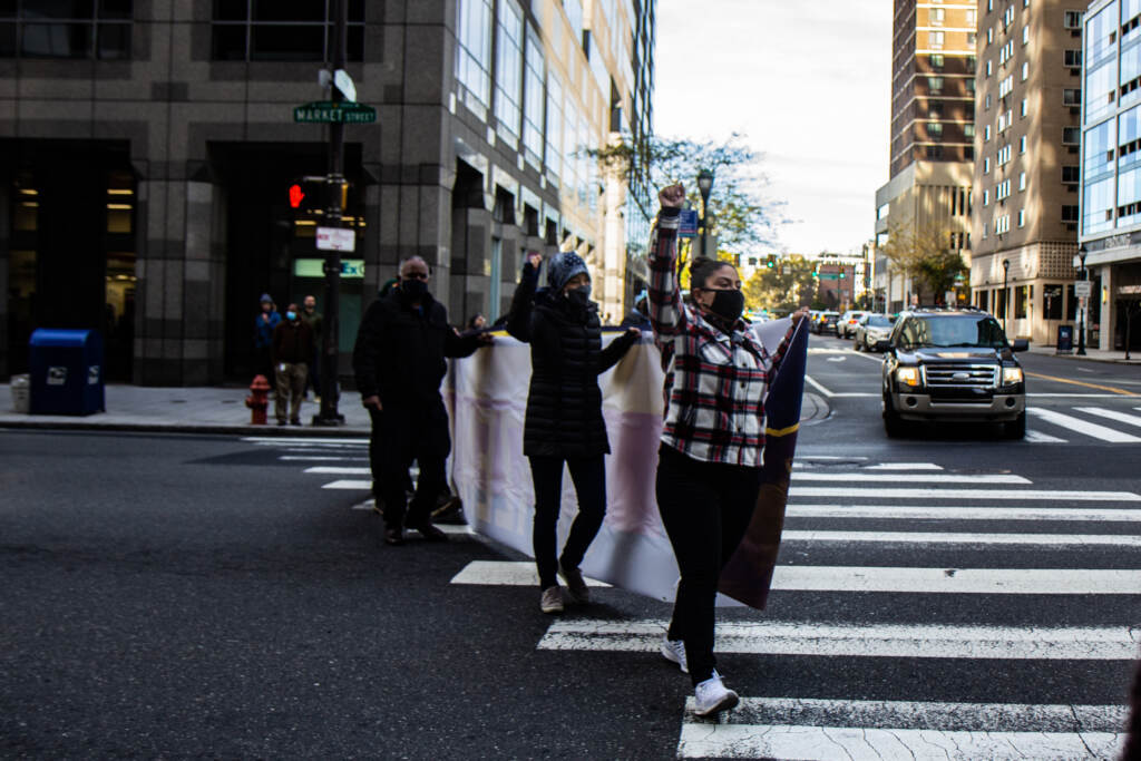 Protesters block traffic during an immigration protest in Philly