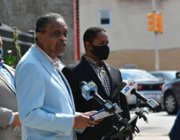 Rev. Robert Collier Sr. speaks at a press conference